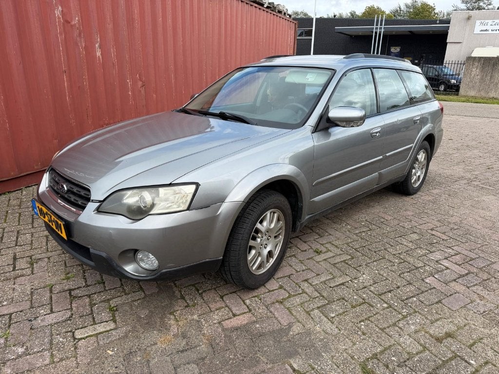 Subaru Legacy 2.5 Outback AUT AWD 2006 Grijs, Auto's, Automaat, Stof, Zwart, 4 cilinders