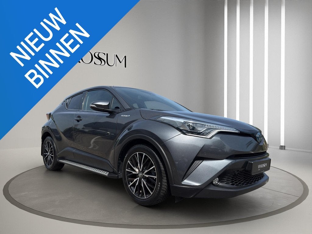 Toyota C-HR 1.8 Hybrid Executive | Navi | Camera | Half lede, Auto's, Toyota, Gebruikt, Euro 6, Leder en Stof, 122 pk
