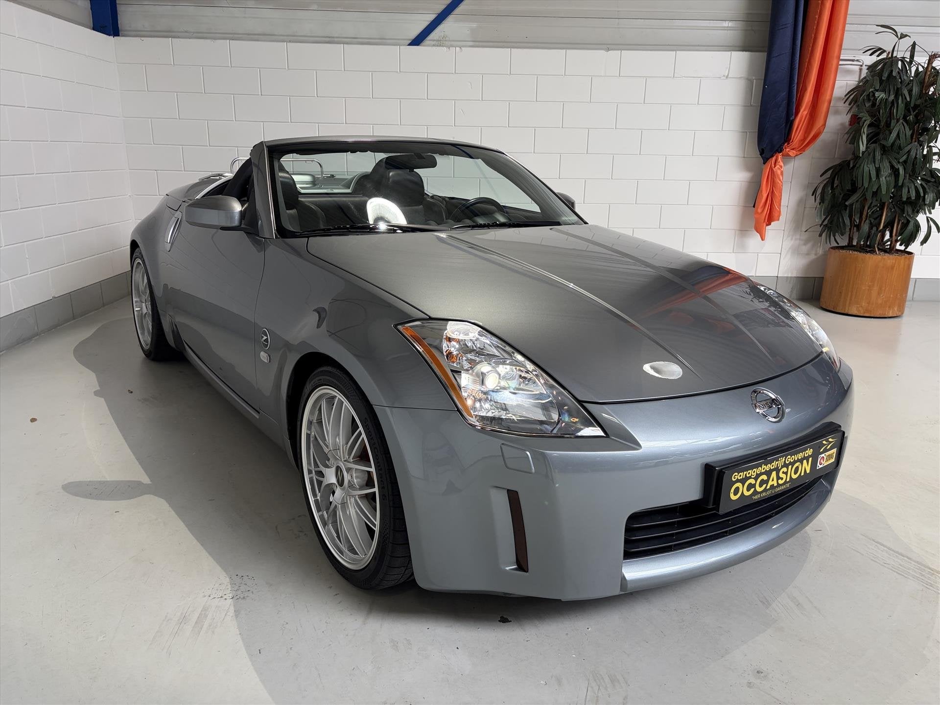 Nissan 350Z 3.5 V6 ROADSTER 280PK 73dkm NL AUTO!, Auto's, Dealer onderhouden, Zwart, Cabriolet, Bedrijf