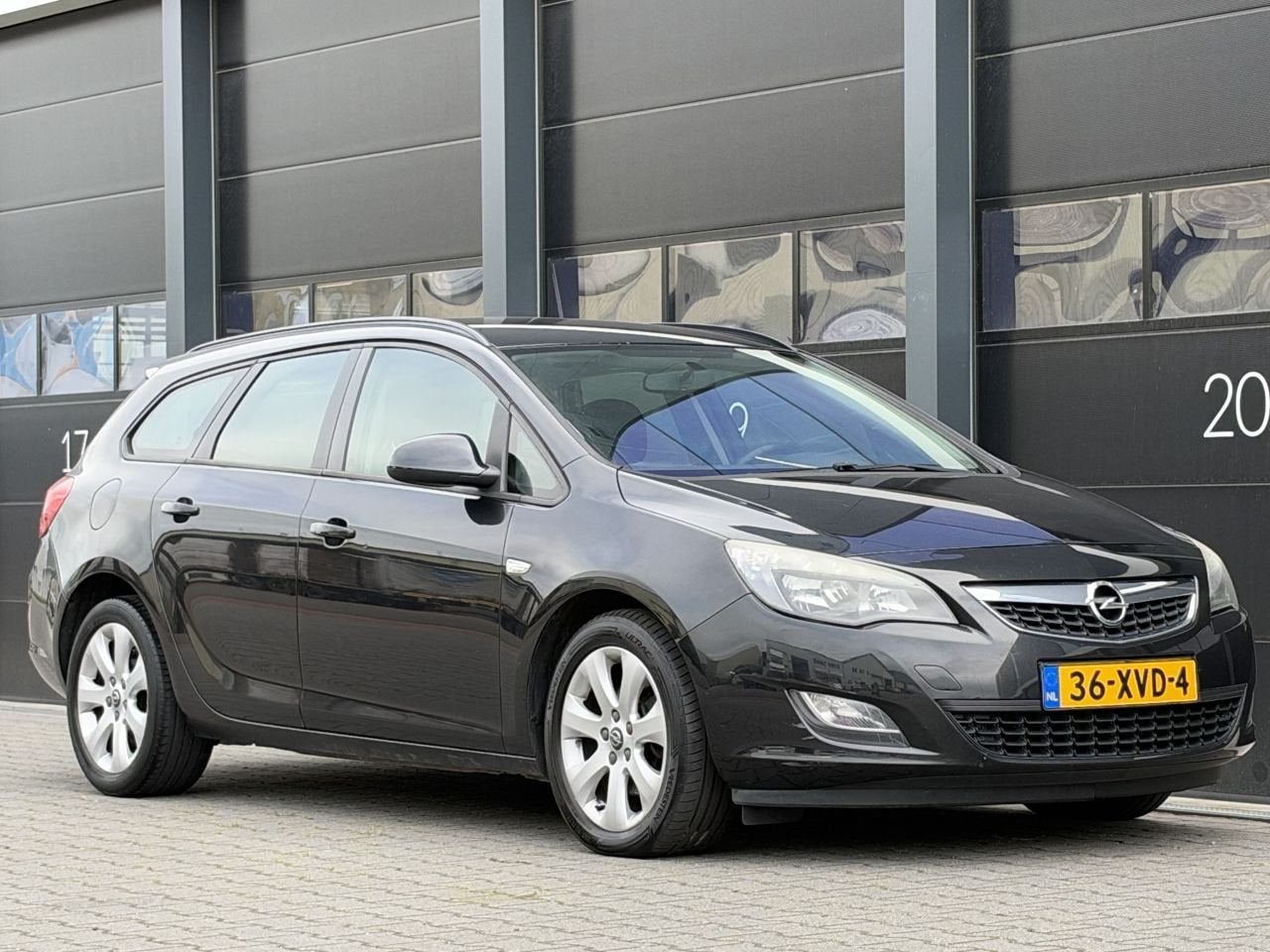 Opel Astra 1.7 CDTi Navi Airco PDC (bj 2012), 1686 cc, Zwart, Astra, 154 €/maand