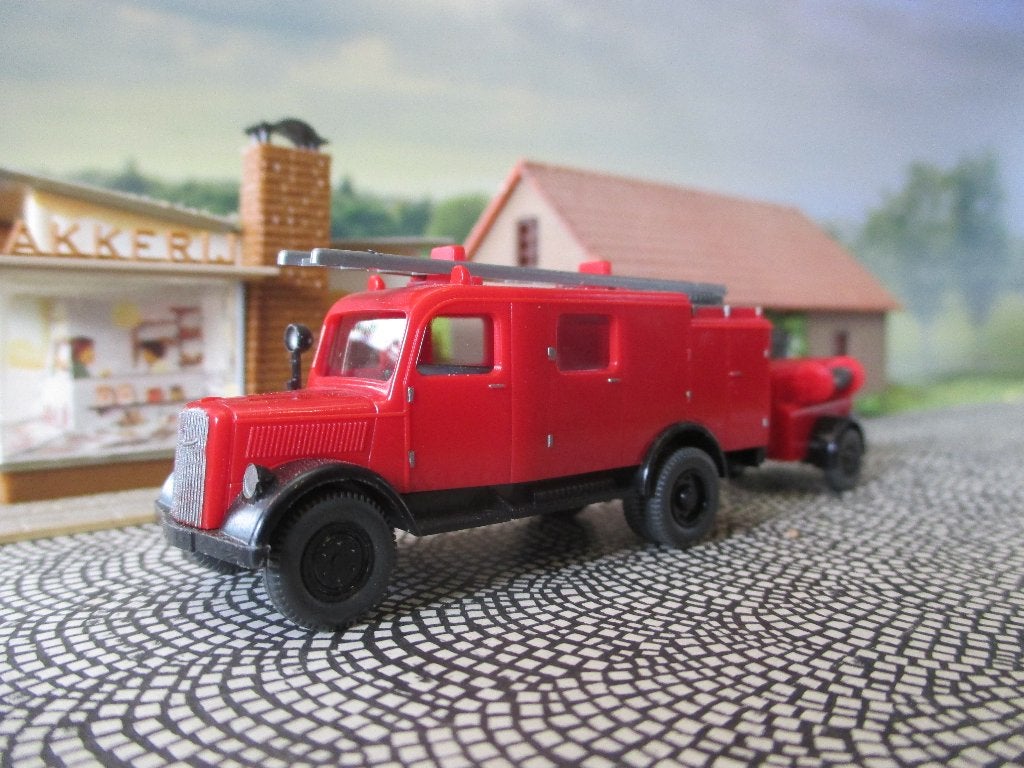 1946-1951 Opel Blitz Brandweer bluswagen met motorpomp, Ophalen of Verzenden, Gebruikt, Bus of Vrachtwagen, Rietze