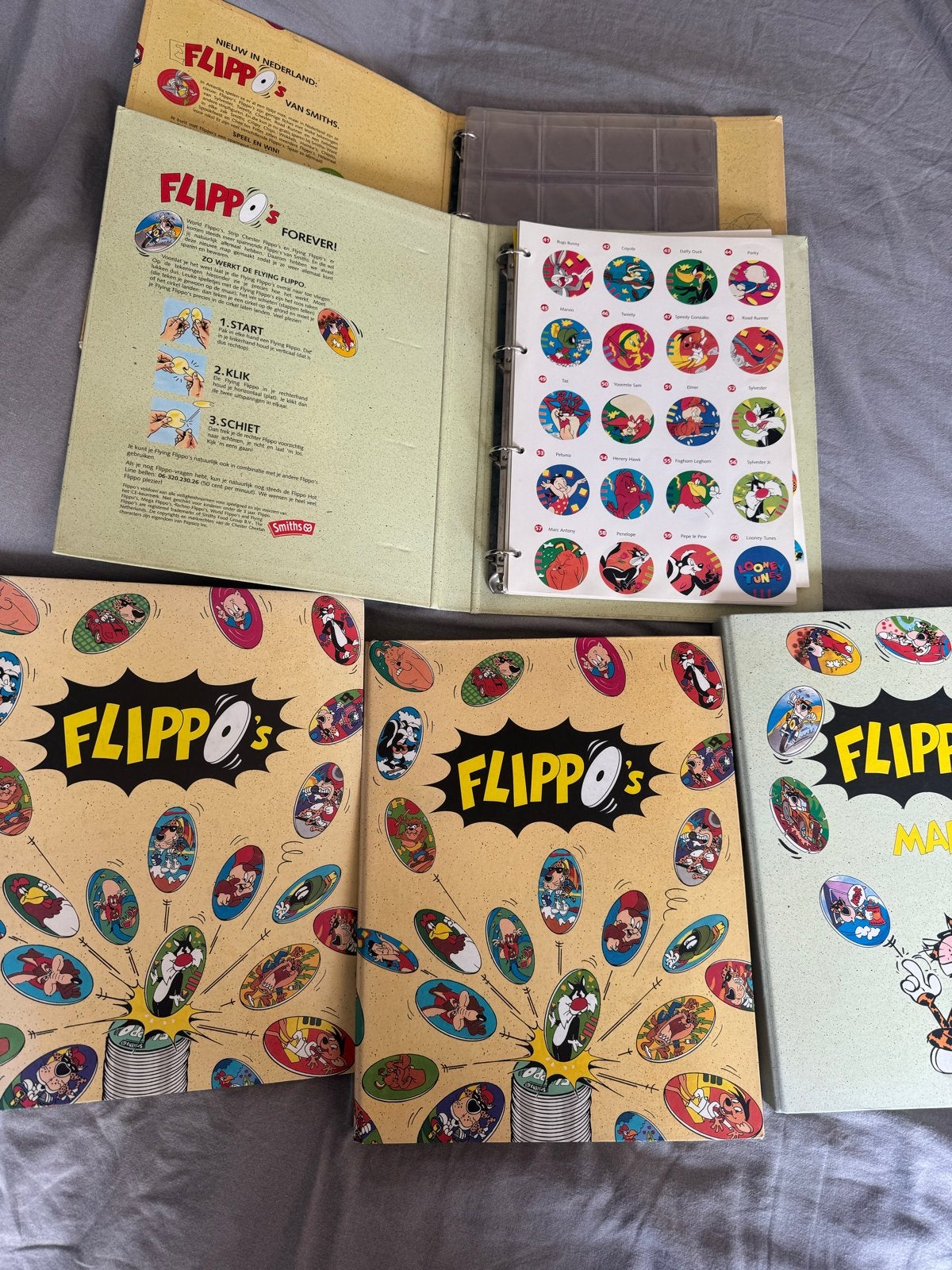 Grote verzameling Flippo's in 5 mappen (ca. 700 stuks), Verzamelen, Ophalen of Verzenden, Spiek, Verzameling, Met verzamelmap(pen)