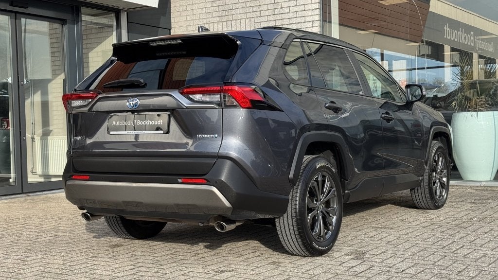 Toyota RAV4 2.5 Hybrid Style | Navi | Camera | Cruise, Auto's, Automaat, Gebruikt, 4 cilinders, Bedrijf