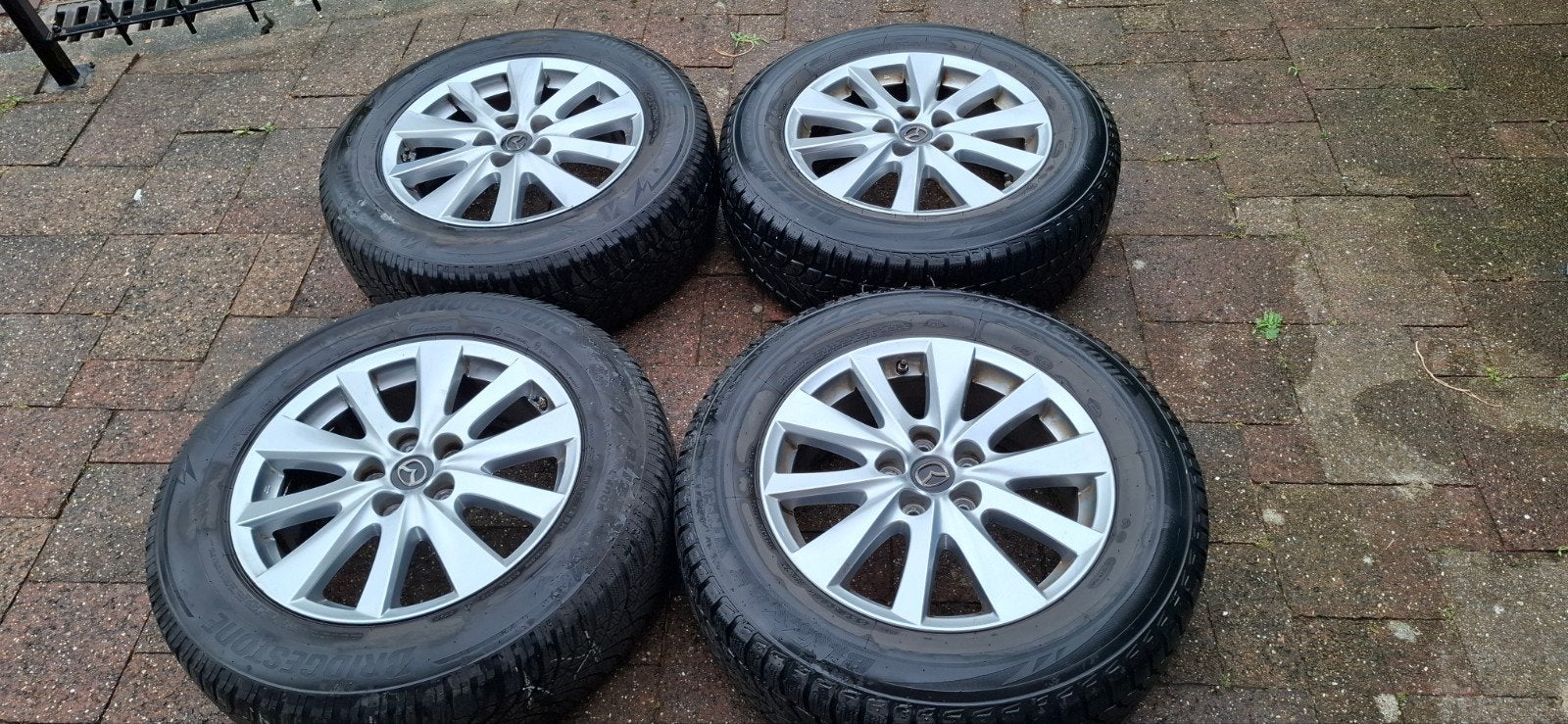 Mazda 17 inch lichtmetalenvelgen + Bridgestone winterbanden, Auto-onderdelen, Banden en Velgen, Ophalen, Gebruikt, Banden en Velgen