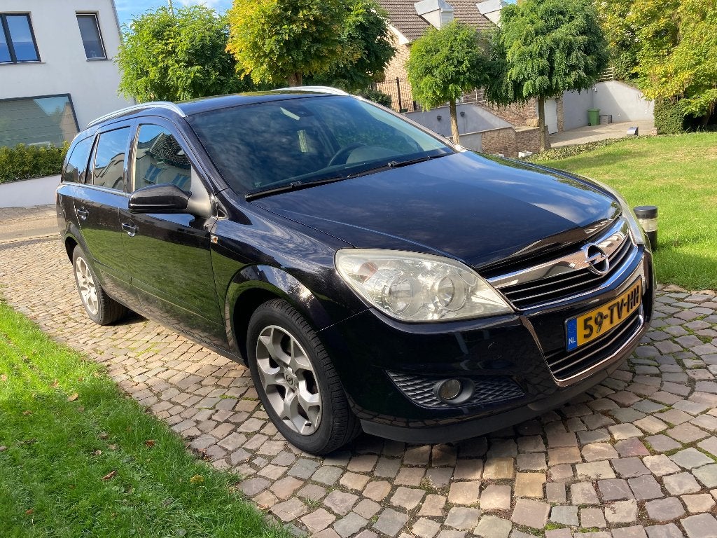 Opel Astra 1.6 16V 85KW St.wgn. 2007 Zwart, Auto's, Voorwielaandrijving, 657 kg, 15 km/l, Zwart