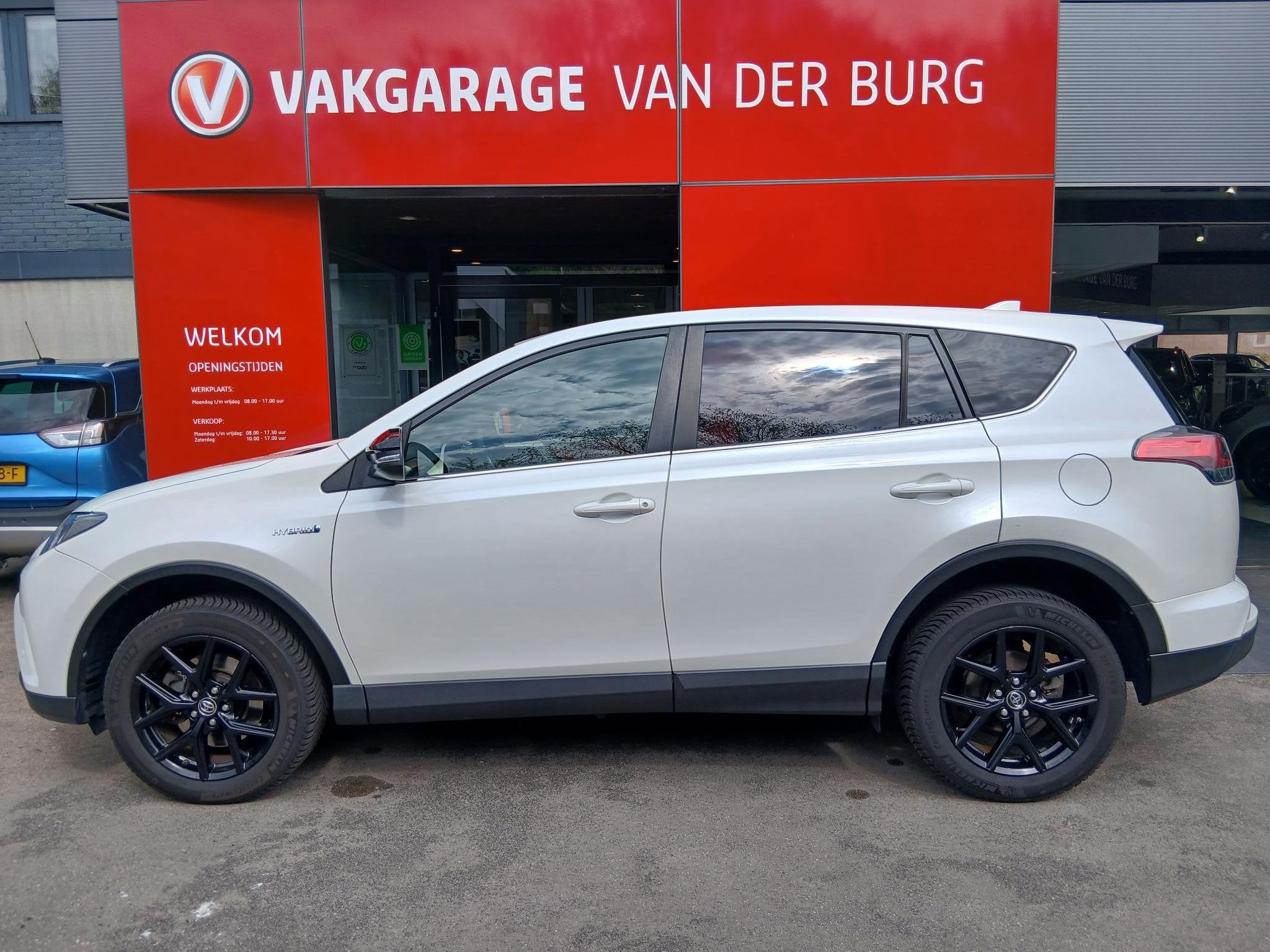 Toyota RAV4 2.5 Hybrid Black Edition, Auto's, Toyota, 12 maanden, Gebruikt, Euro 6, Wit
