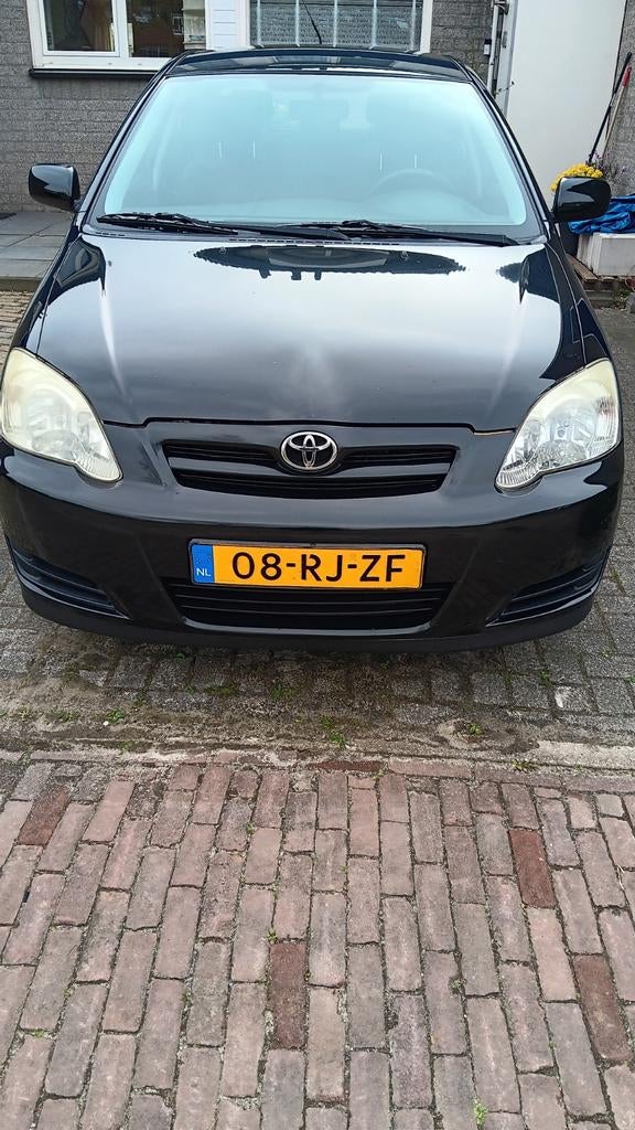 Toyota Corolla 1.4 D-4d 90 5-DRS 2005 Zwart, Auto's, 4 cilinders, Corolla, Zwart, Origineel Nederlands