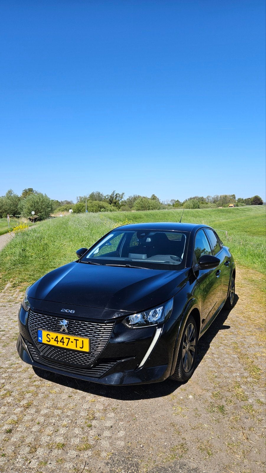 Peugeot 208 EV 50kWh 136pk 2023 Zwart, Auto's, Zwart, Origineel Nederlands, Elektrisch, Particulier