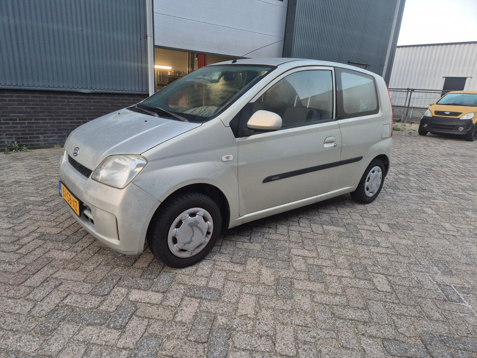 Daihatsu Cuore 1.0 3D 2005 NAP NIEUWE APK, Auto's, Daihatsu, 600 kg, 18 €/maand, Cuore, Beige