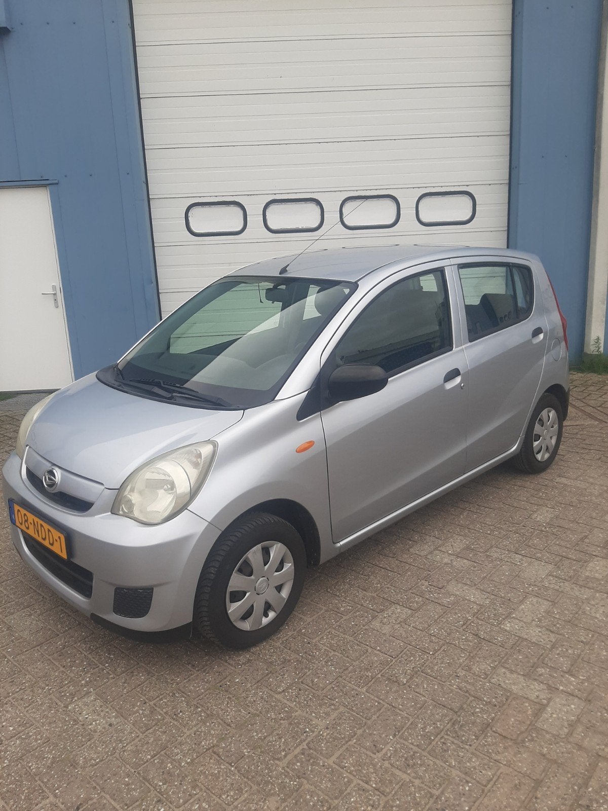 Daihatsu Cuore 1.0 5D 2010 Grijs, Auto's, Voorwielaandrijving, 600 kg, 18 €/maand, 4 stoelen