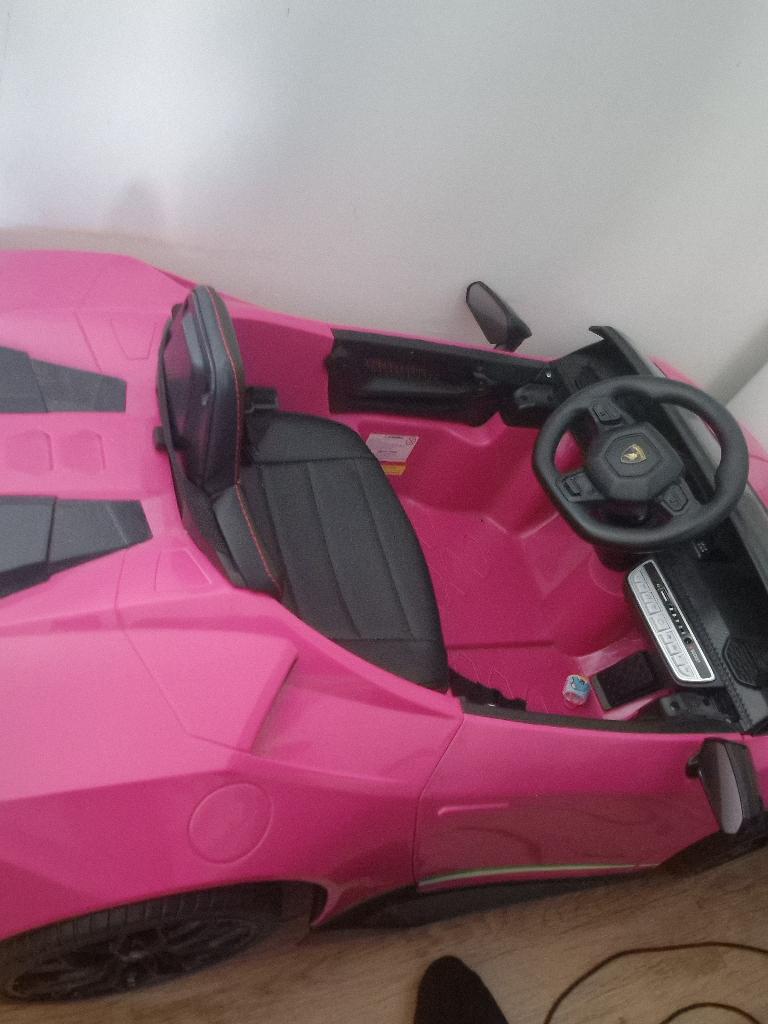 Elktric kimder auto lamborghini roze, Kinderen en Baby's, Speelgoed | Speelgoedvoertuigen, Ophalen, Zo goed als nieuw, Afstandsbediening