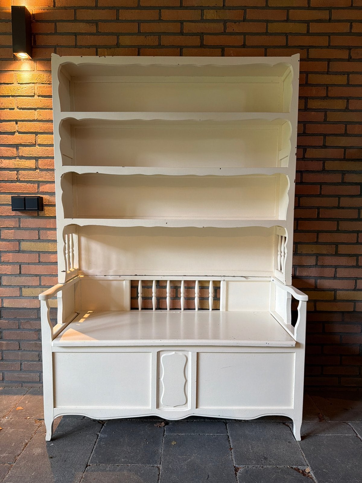 Klepbank met opbergruimte en boekenplanken, Ophalen