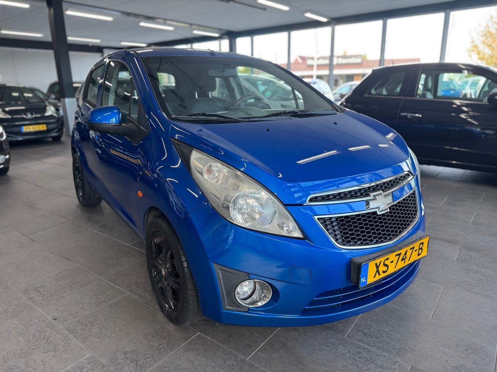 Chevrolet Spark 1.0 16V LE airco elektrische pakket lm-velge, Auto's, Voorwielaandrijving, Stof, Gebruikt, 4 cilinders