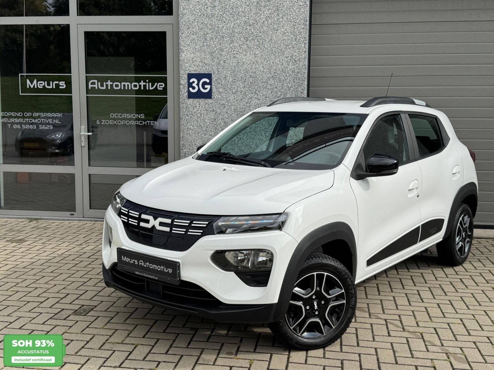 Dacia Spring Comfort Plus 27 kWh SOH 93% CCS/Navi/Camera/Car, Auto's, Dealer onderhouden, Zwart, 230 km, Wit