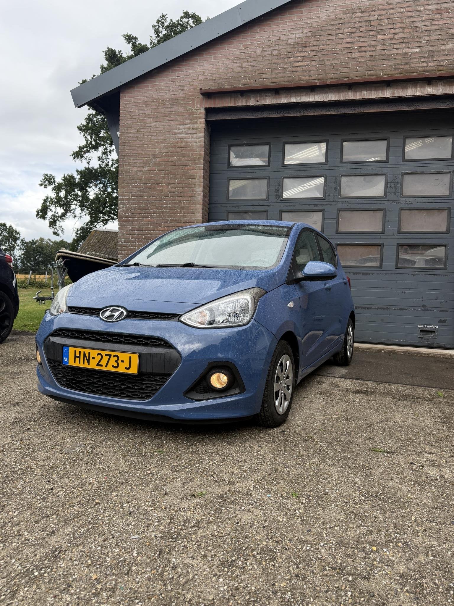 Hyundai i10 1.0i i-Motion Comfort Airco/NAVI/NAP, Auto's, Voorwielaandrijving, Euro 5, Stof, Gebruikt