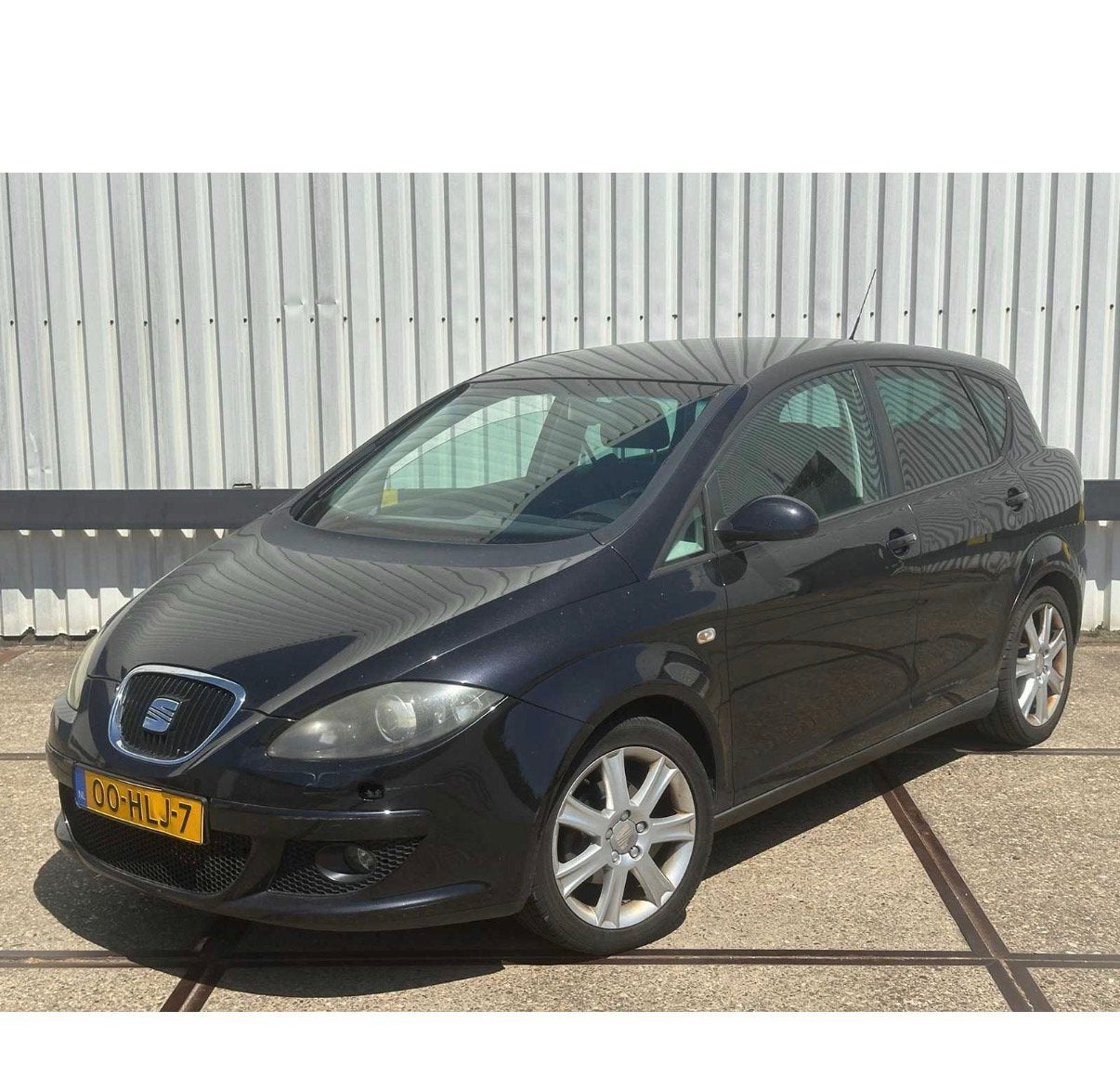 Seat Toledo 1.6 74KW 2009 Zwart, Auto's, Seat, Zwart, 4 cilinders, Zwart, Handgeschakeld