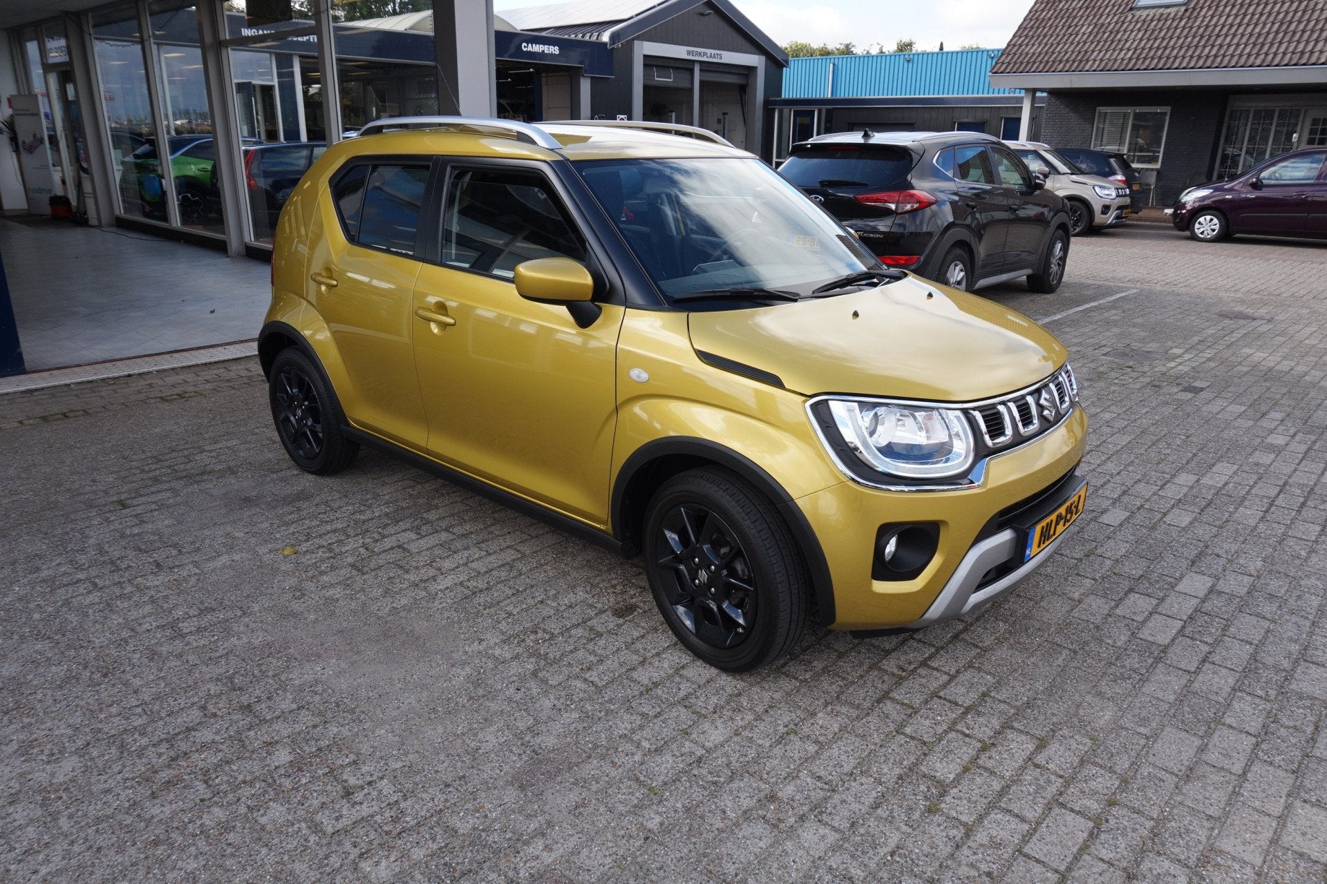 Suzuki Ignis 1.2 Smart Hybrid Style Automaat Incl nw apk/beu, Auto's, Stof, Gebruikt, 4 cilinders, Geel