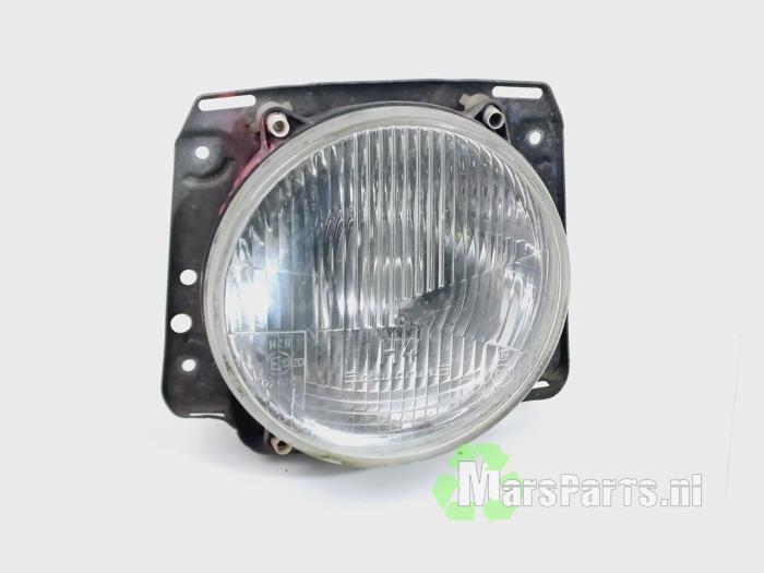 Koplamp links van een Volkswagen Golf
