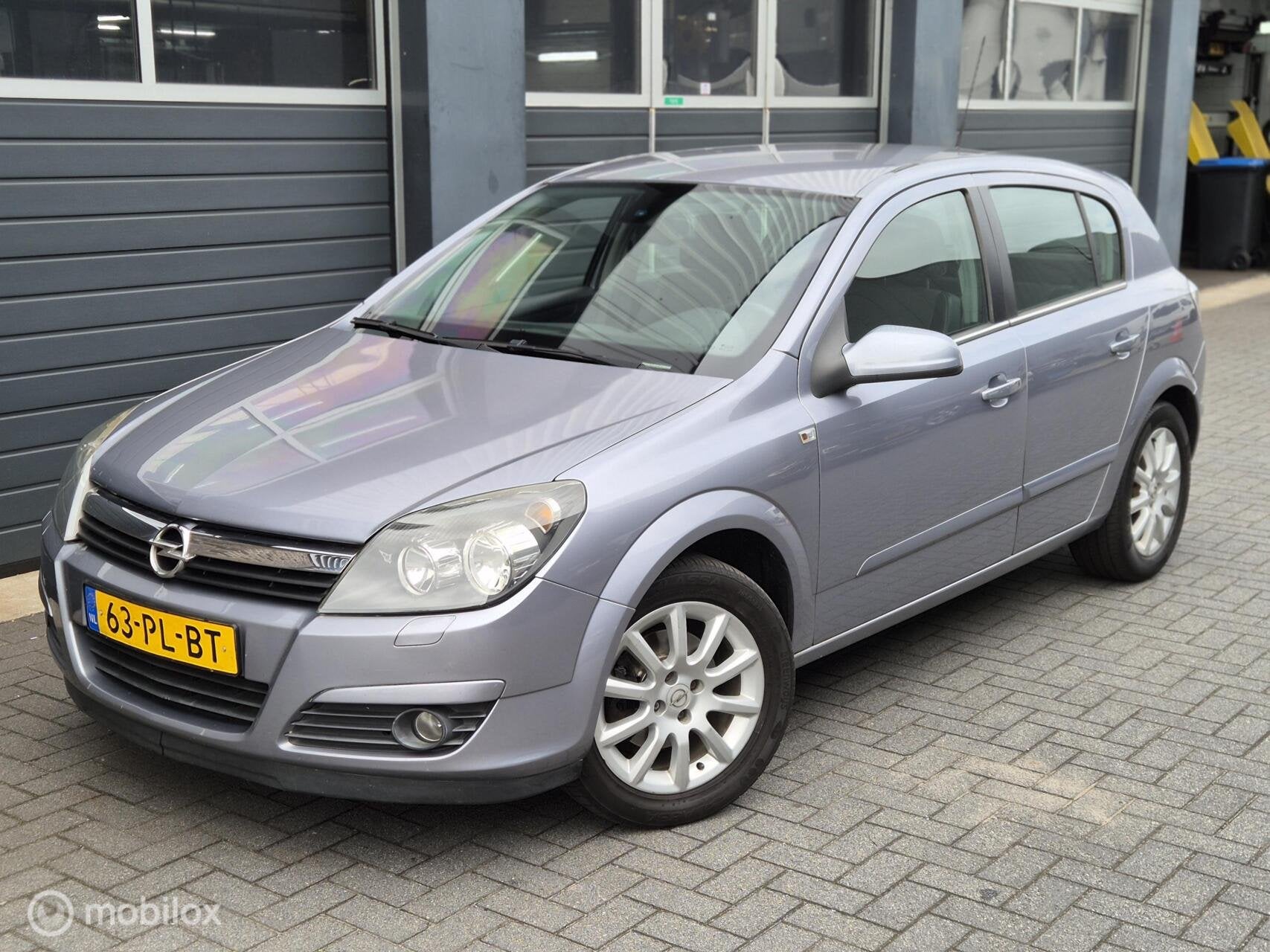 Opel Astra 1.6 Cosmo | CLIMA | ELEK RAMEN | CRUISE |, Voorwielaandrijving, 15 km/l, Gebruikt, 4 cilinders