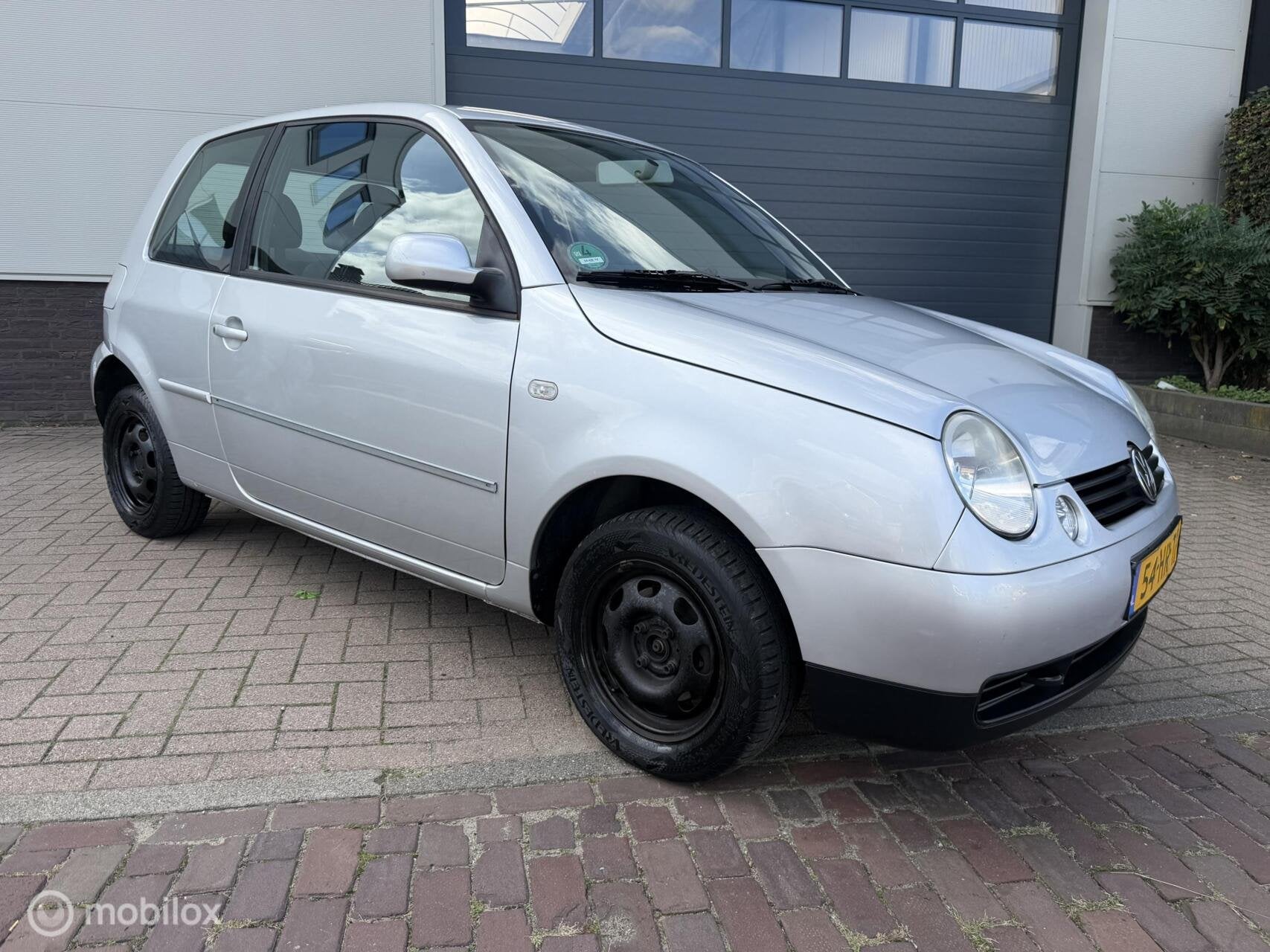 Volkswagen Lupo 1.4-16V Trendline AUTOMAAT, Auto's, Dealer onderhouden, 31 €/maand, 4 cilinders, 4 stoelen