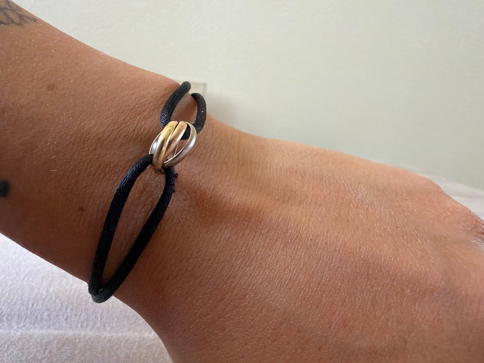 Cartier Trinity armband met doos en bon, Sieraden, Tassen en Uiterlijk, Armbanden, Ophalen, Gebruikt, Zwart, Goud