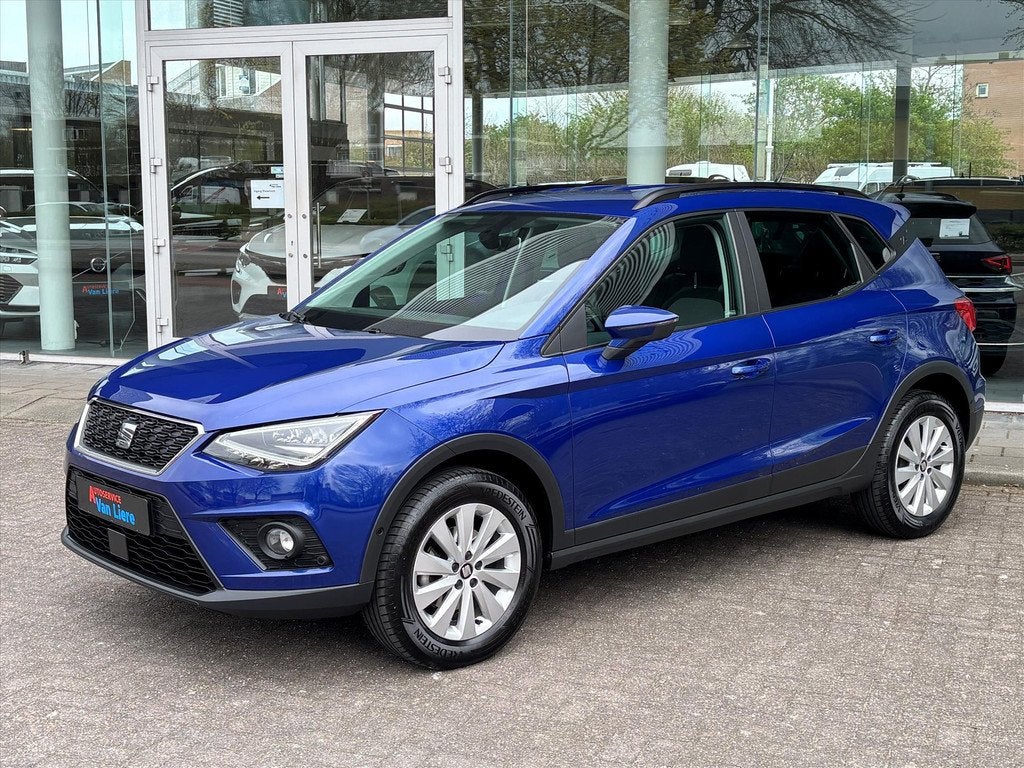 SEAT Arona 1.0 TSI 95pk Style Business Intense|NL Auto| Navi, Auto's, Keurmerk '100% Onderhouden', 12 maanden, Stof, Gebruikt