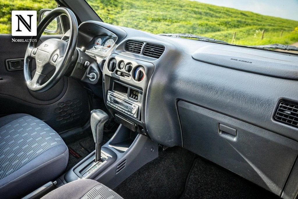 Daihatsu Terios 1.3 SXE |Automaat |Nap |Airco |Trekhaak, Auto's, Daihatsu, 1350 kg, Metallic lak, 4 cilinders, Met garantie (alle)