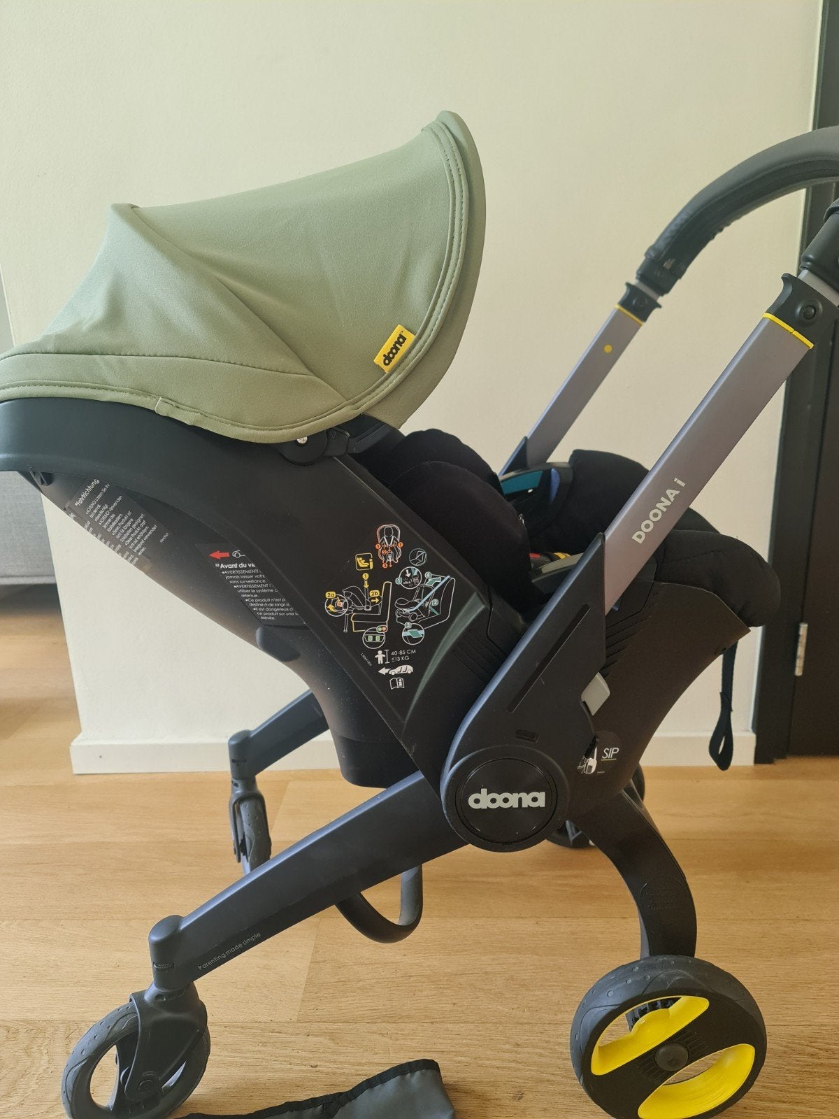 Doona i autostoel met geïntegreerde kinderwagen (Groen), Kinderen en Baby's, Autostoeltjes, Overige merken, 0 t/m 13 kg, Autogordel of Isofix