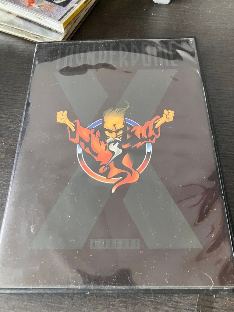 Thunderdome X – A Decade / DVD Evidence – ID&T (2002), Alle leeftijden, Ophalen of Verzenden, Zo goed als nieuw, Muziekvideo's