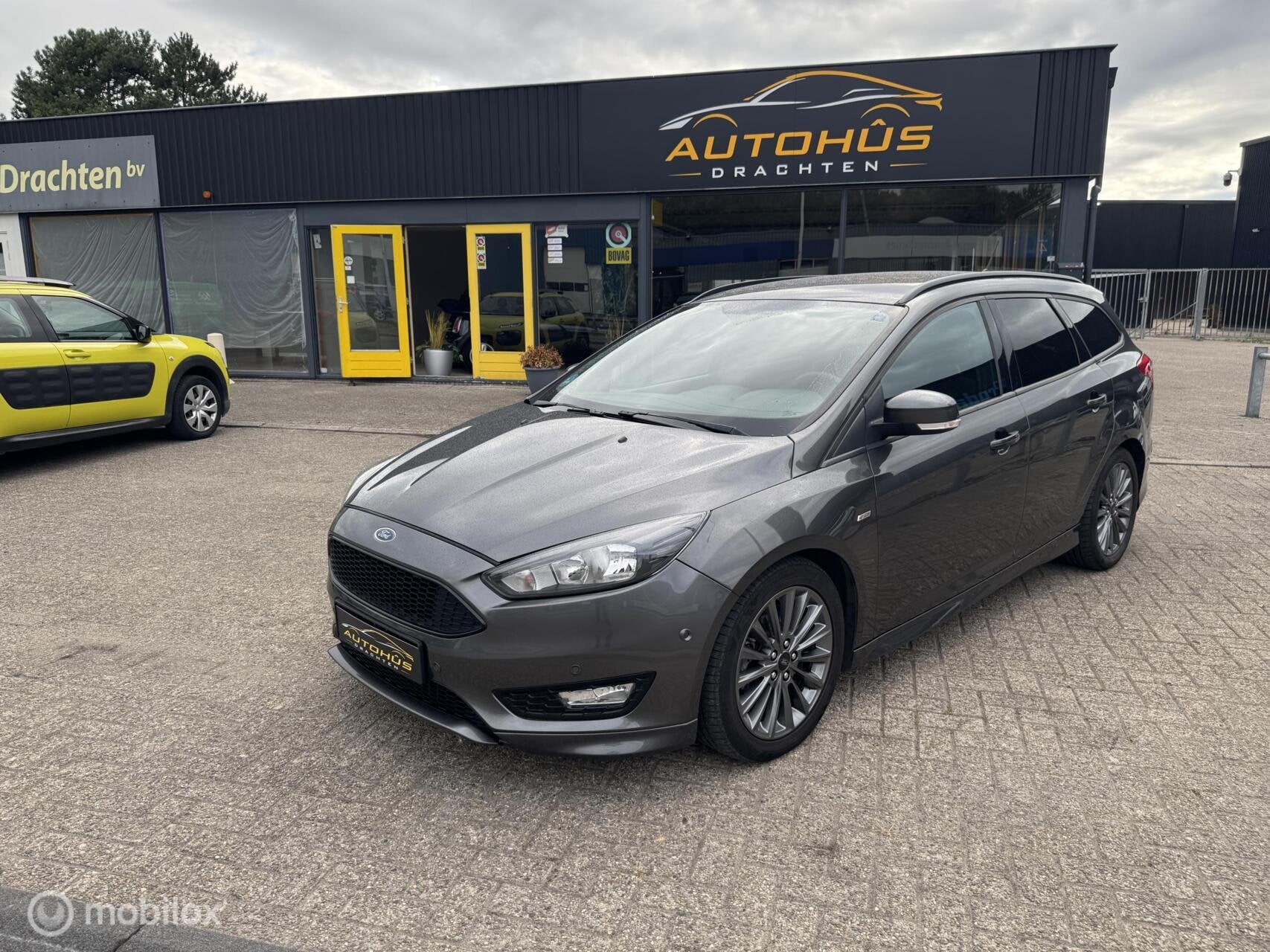 Ford Focus Wagon 1.0 ST-Line navi cruise lm velgen 112155 km, Auto's, Dealer onderhouden, 125 pk, Gebruikt, Zwart