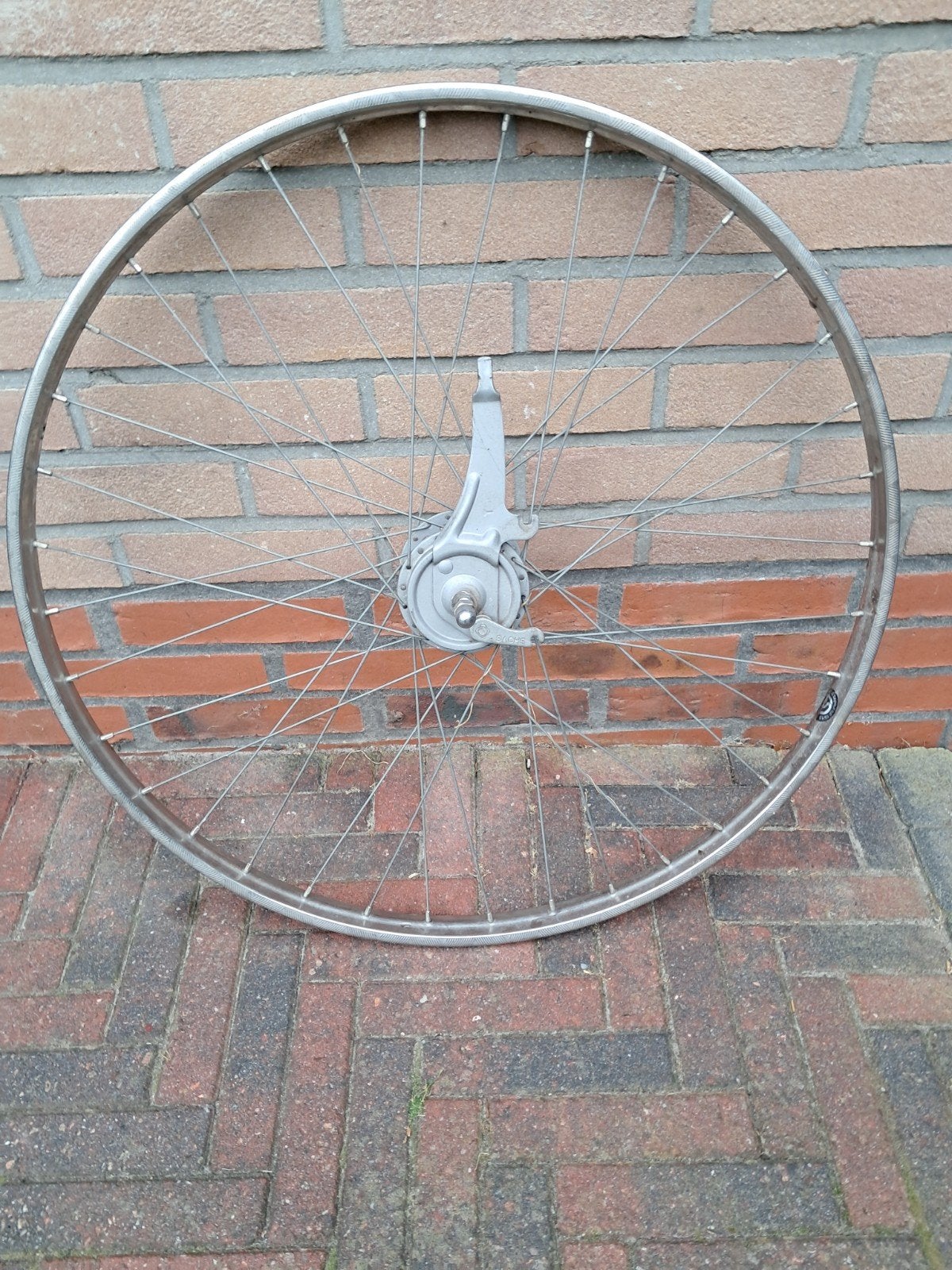Sachs voorwiel roestvrij stalen velg, Ophalen