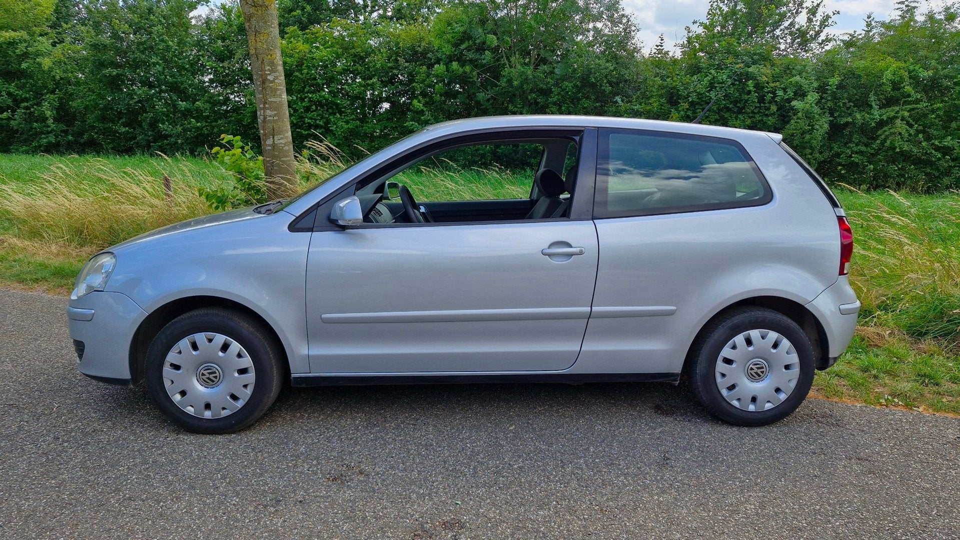 Volkswagen Polo 1.4-16V Optive 80PK | Airco | Elektr. pakket, Auto's, Voorwielaandrijving, Stof, Gebruikt, Zwart