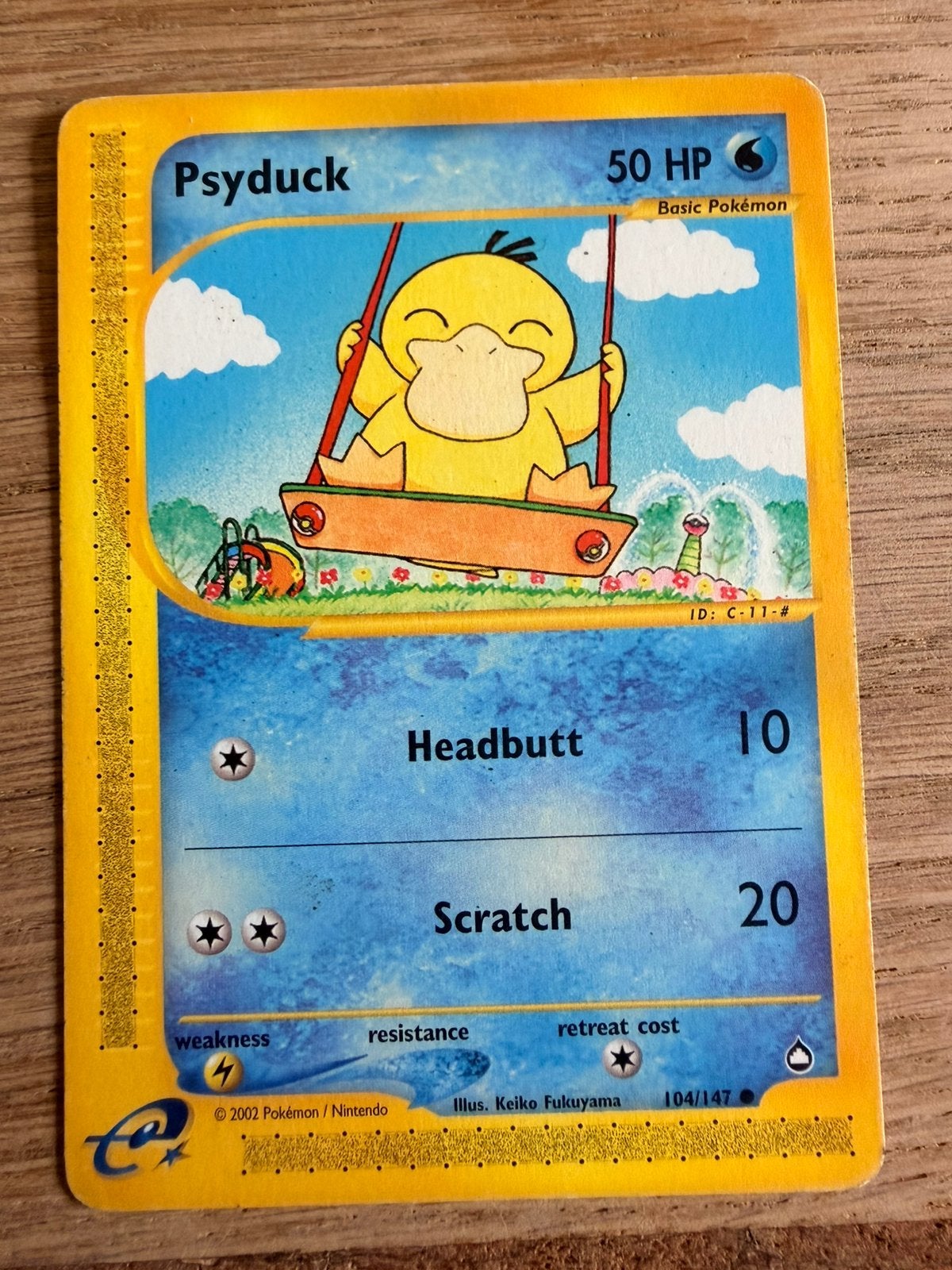 Psyduck - 104/147, Ophalen of Verzenden, Zo goed als nieuw