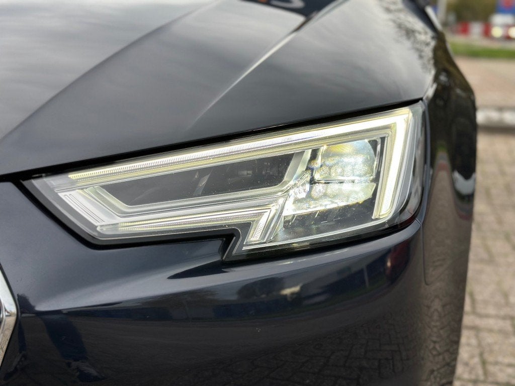 Audi A4 1.4 TFSI Lease Edition '' Schuif/kanteldak - Virtual, Auto's, Audi, Gebruikt, Euro 6, 4 cilinders, Blauw