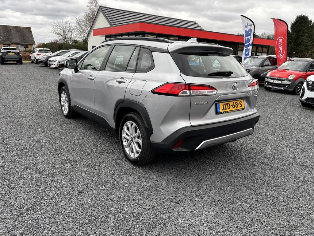 Toyota Corolla Cross HYBRID 140 ACTIVE (bj 2024, automaat), Auto's, Stof, Gebruikt, Met garantie (alle), Bedrijf