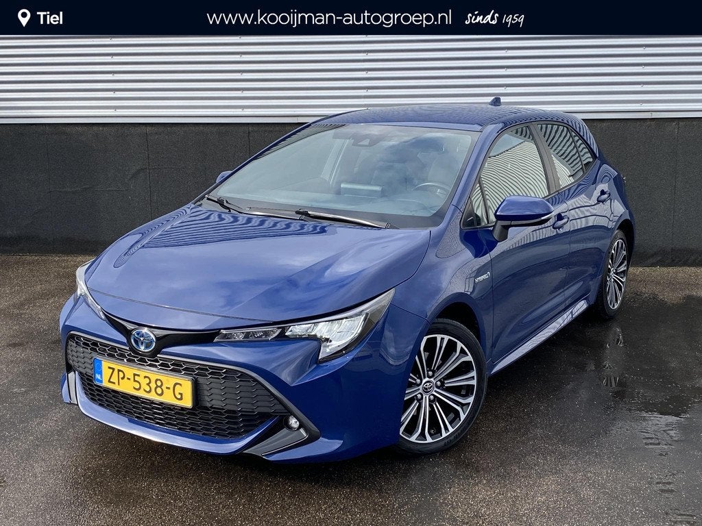 Toyota Corolla 1.8 Hybrid First Edition Trekhaak, navigatie,, Gebruikt, 4 cilinders, Blauw, Corolla