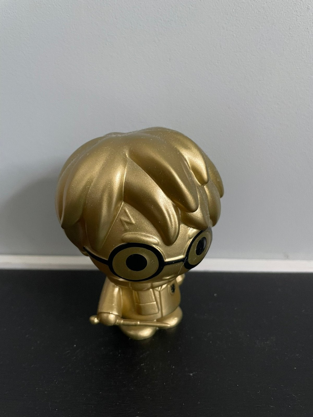 Harry Potter, goud poppetje, Ophalen of Verzenden, Actiefiguurtje