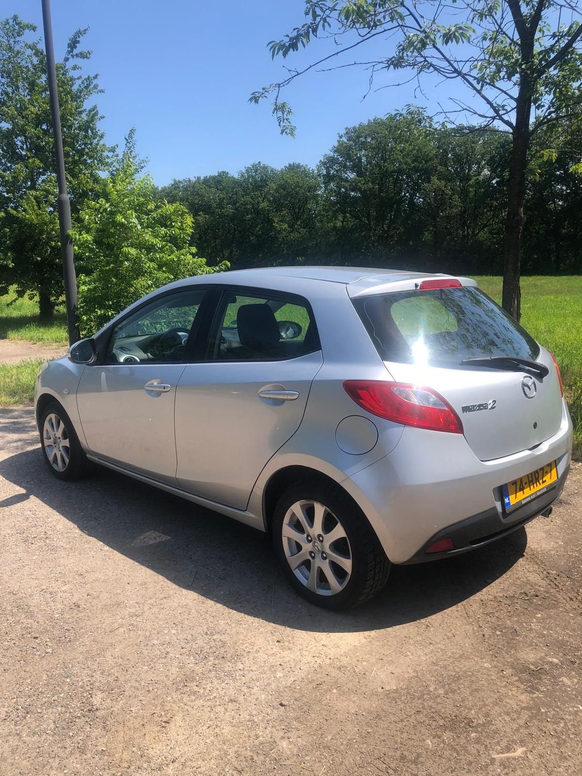 Mazda 2 1.3 55KW 5DRS 2009 Grijs, Auto's, Mazda, Voorwielaandrijving, 74 pk, 31 €/maand, 4 cilinders