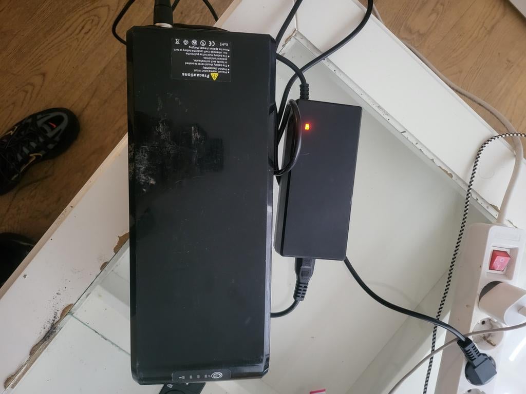 Knaap batterij met oplader, Ophalen