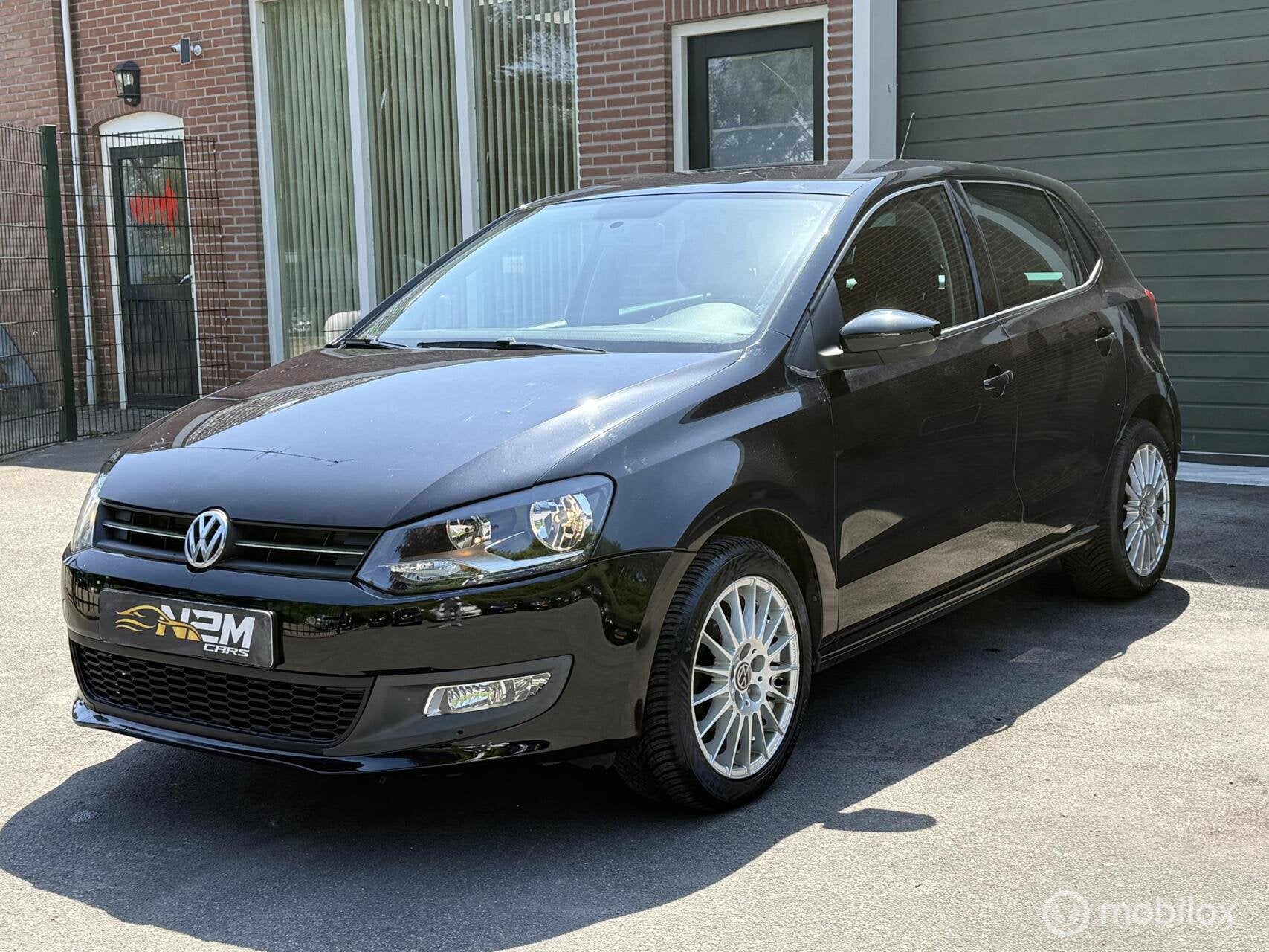 Volkswagen Polo 1.2 TSI BlueMotion Comfort Edition, Auto's, Voorwielaandrijving, Euro 5, Stof, Zwart