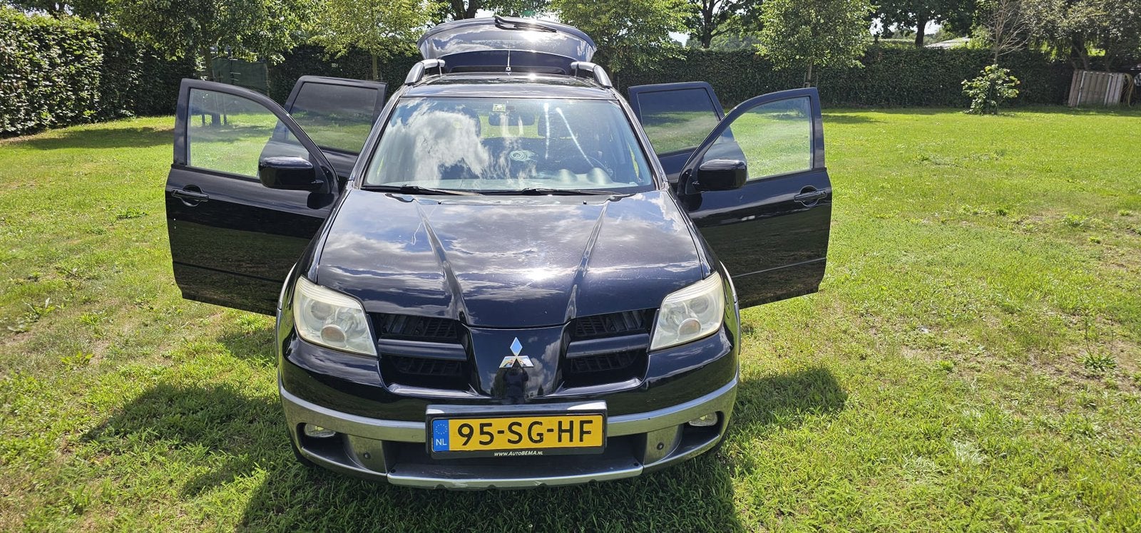 Mitsubishi Outlander 2.4 MPI 4WD AUTOMAAT, Auto's, Automaat, Outlander, Zwart, 4 cilinders