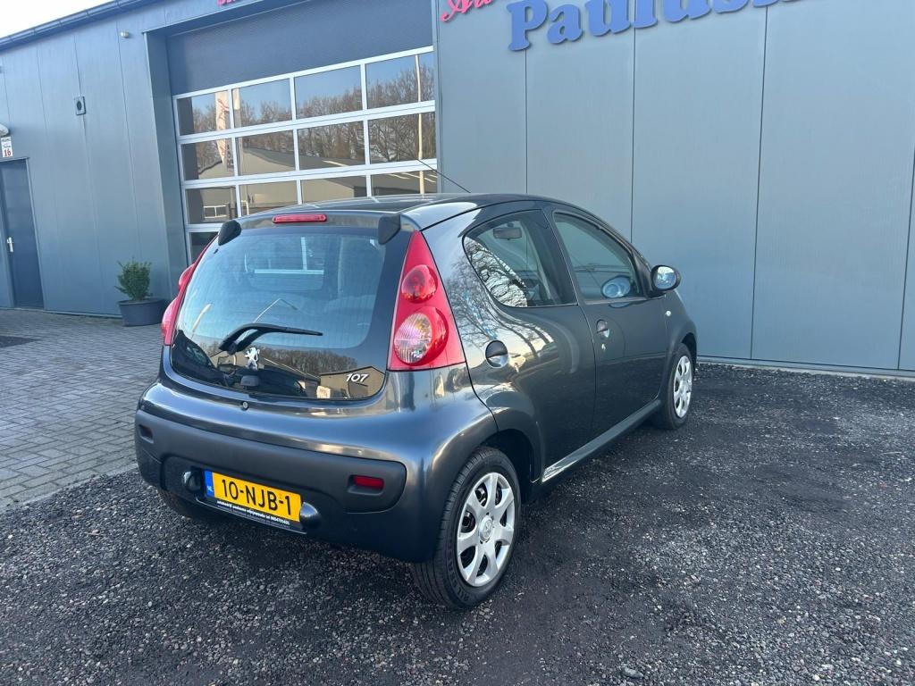 Peugeot 107 1.0-12V XR Inc garantie (bj 2005), Auto's, Voorwielaandrijving, Gebruikt, Zwart, 4 stoelen