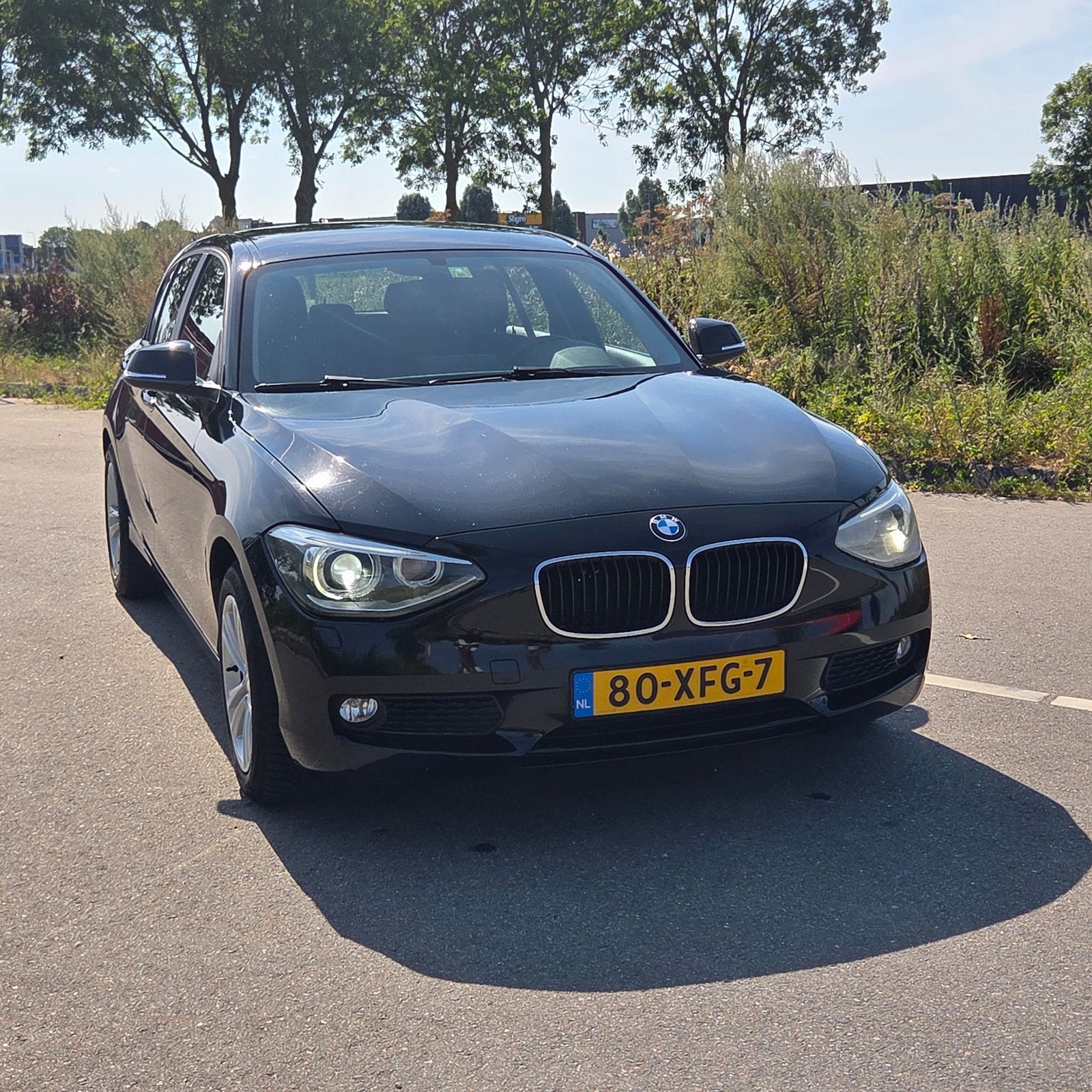 BMW 1-Serie 116I 100KW 5DR Aut8 2012 Zwart, Zwart, 4 cilinders, Zwart, Origineel Nederlands