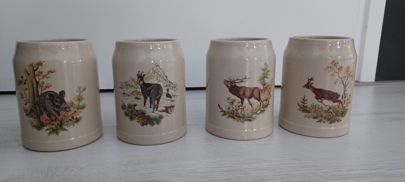 Bierpullen, 4 stuks met dierenmotief, Ophalen of Verzenden, Gebruikt, Beeldje of Figuurtje