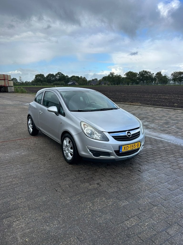 Opel Corsa 1.2 16V 3D 2009 Grijs, Voorwielaandrijving, 40 €/maand, Zwart, 1229 cc