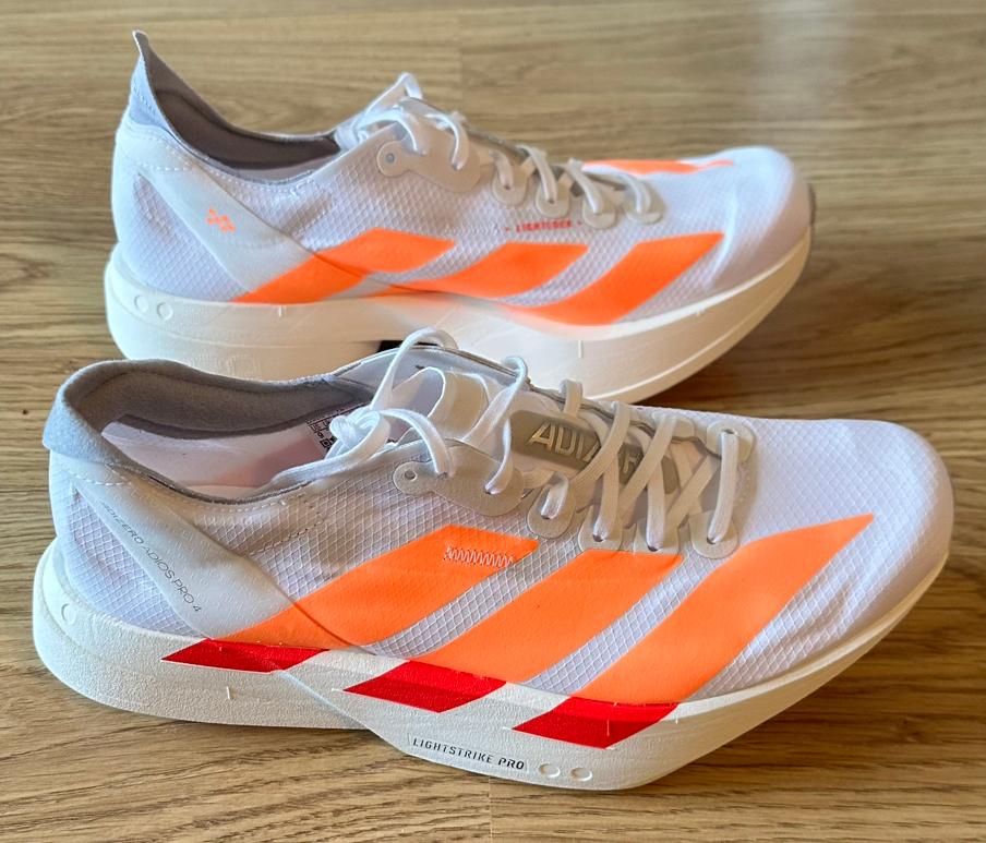 GLOEDNIEUWE Adidas Adizero Adios Pro 4. MAAT: 41 1/3, Kleding | Dames, Sportkleding, Ophalen of Verzenden, Nieuw, Oranje, Hardlopen of Fietsen