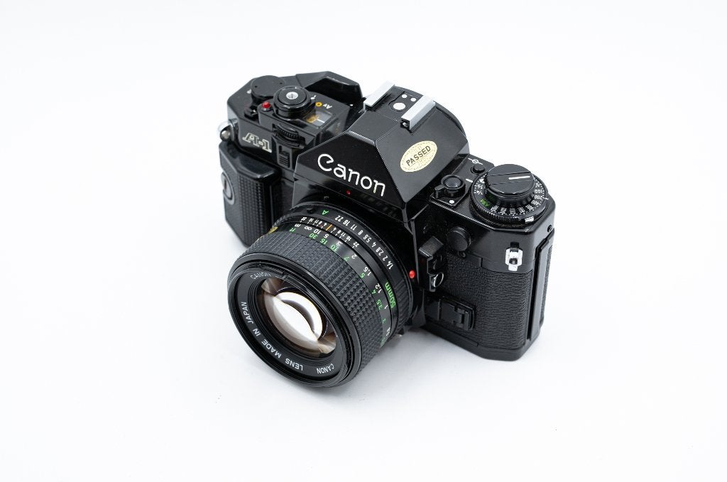 Canon A-1 + Canon nFD 50mm f/1.4, Ophalen of Verzenden, Gebruikt, Spiegelreflex, Canon