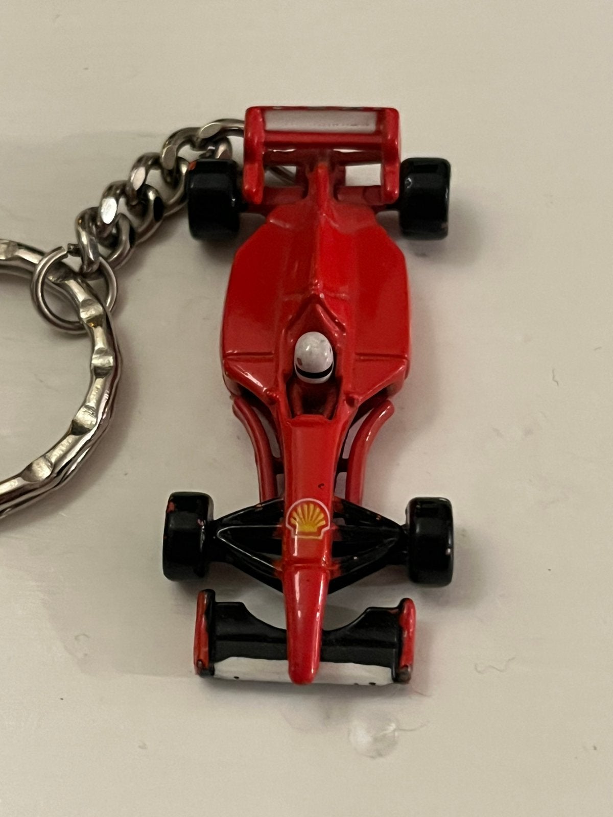Vintage Sleutelhanger Formule 1 auto Ferarri Shell, Verzamelen, Ophalen of Verzenden, Zo goed als nieuw, Sport
