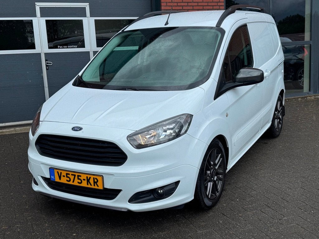 Ford Transit Courier 1.5 TDCI Sport Airco Cruise Navi Camera, Voorwielaandrijving, Gebruikt, Euro 6, Leder en Stof