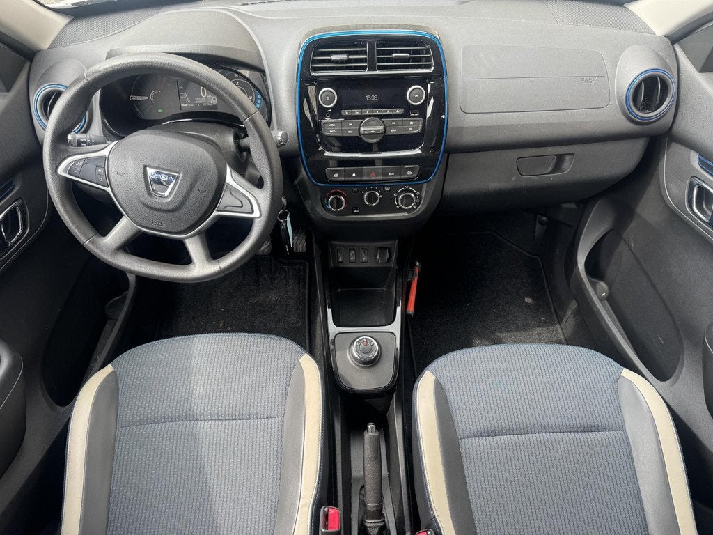 Dacia Spring Comfort 27 kWh | SOH 92% | Volledig Dealer Onde, Auto's, Dacia, Gebruikt, Huisgarantie, Met garantie (alle), Leder en Stof